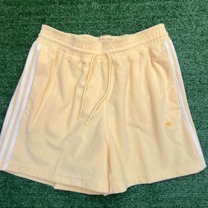Yellow adidas corduroy shorts